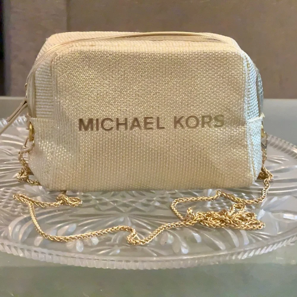 Michael Kors Shimmering Cream Gold Pouch with golden sling